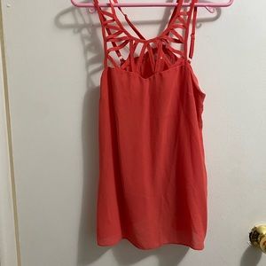 Burnt orange sheer blouse with detailed neckline